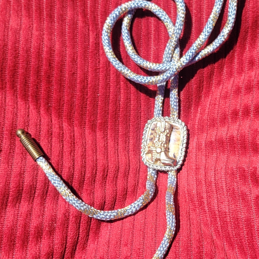 Vintage Western Bolo Tie Golden Cowboy Boot on Polished Stone